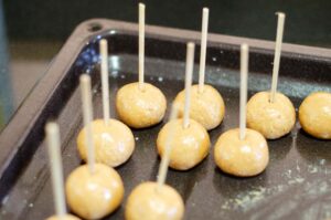 Coconut balls with lollipop sticks
