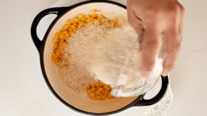 Adding rice to the pot