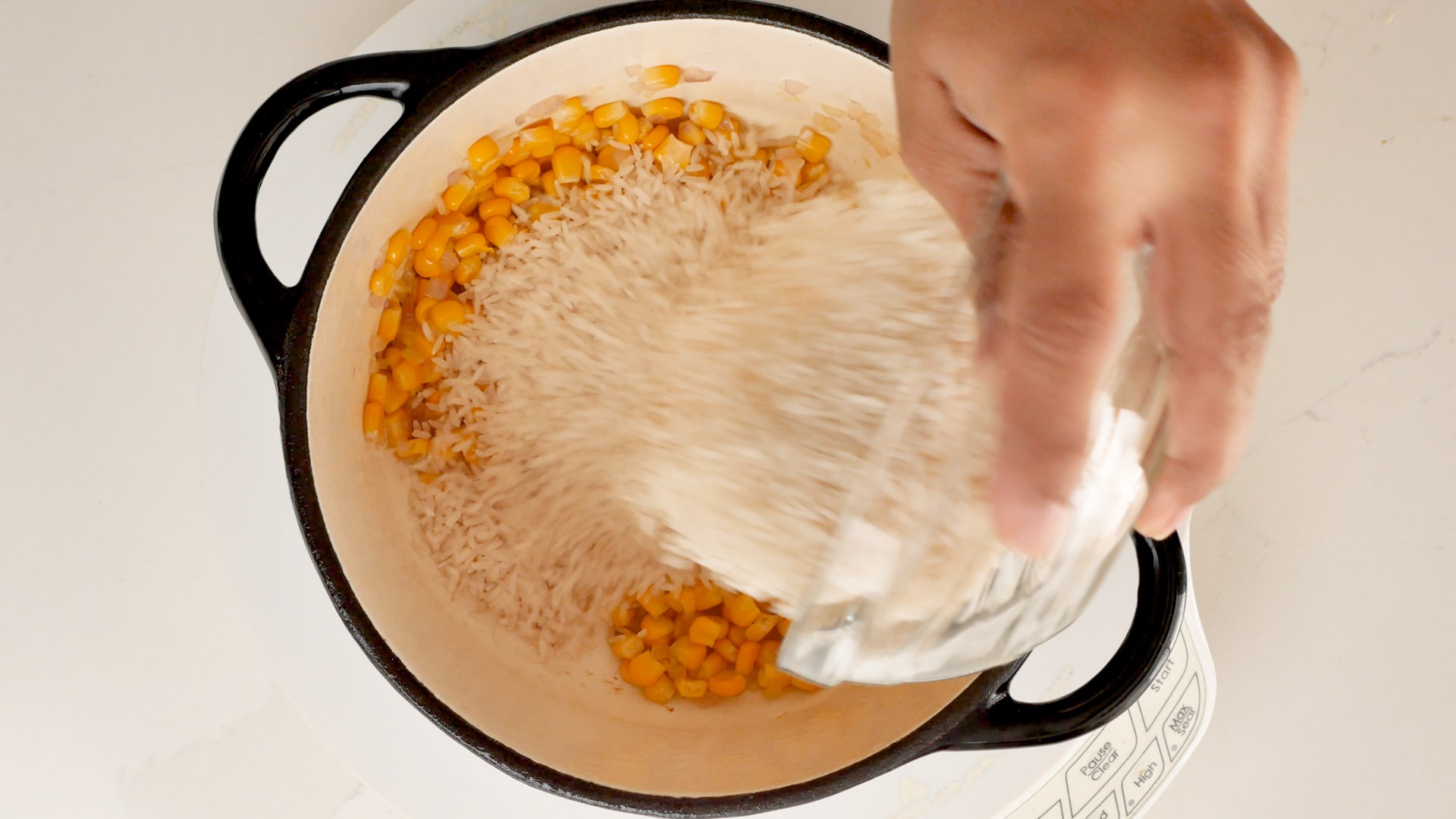 Adding rice to the pot