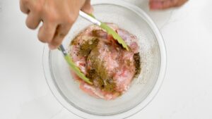 Seasoning the chicken