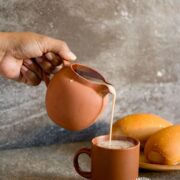 Pouring avena caliente (hot oatmeal drink)