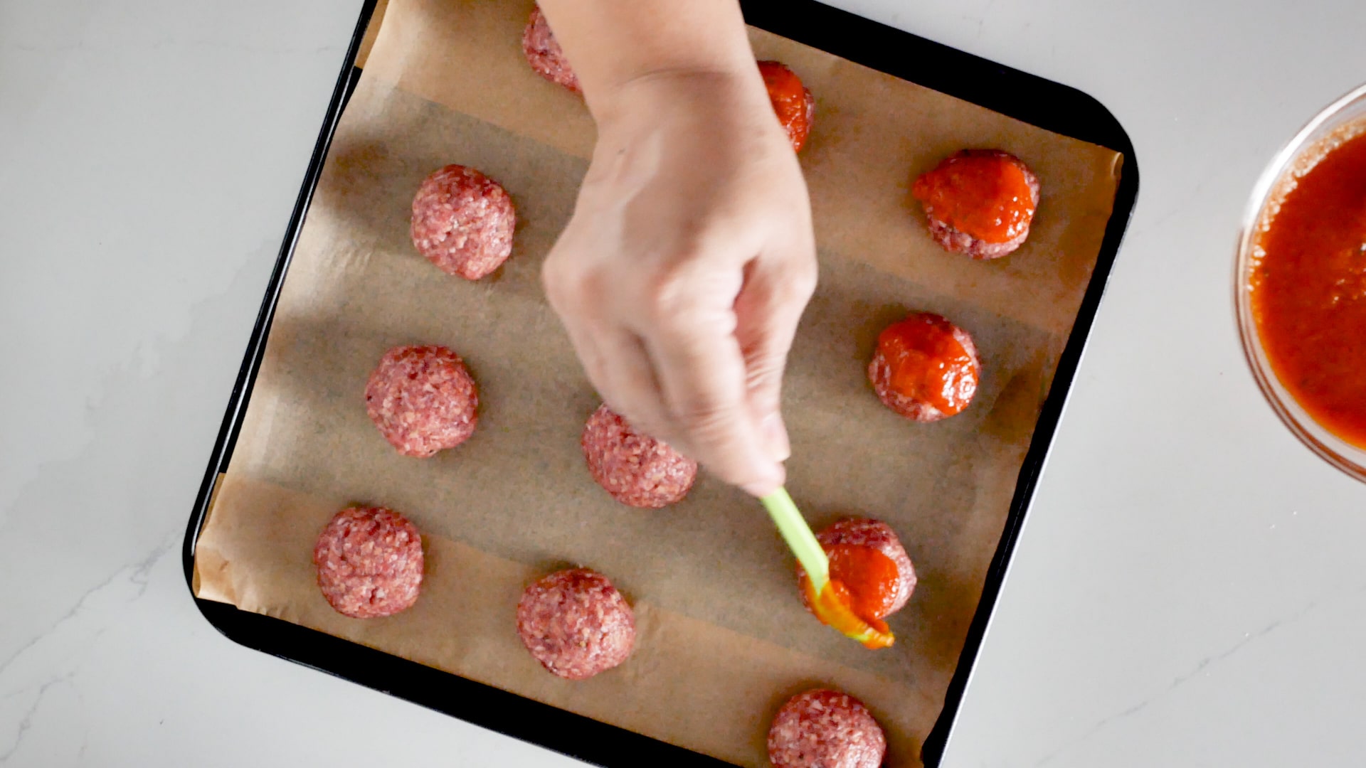 Bathing meatballs with tomato sauce