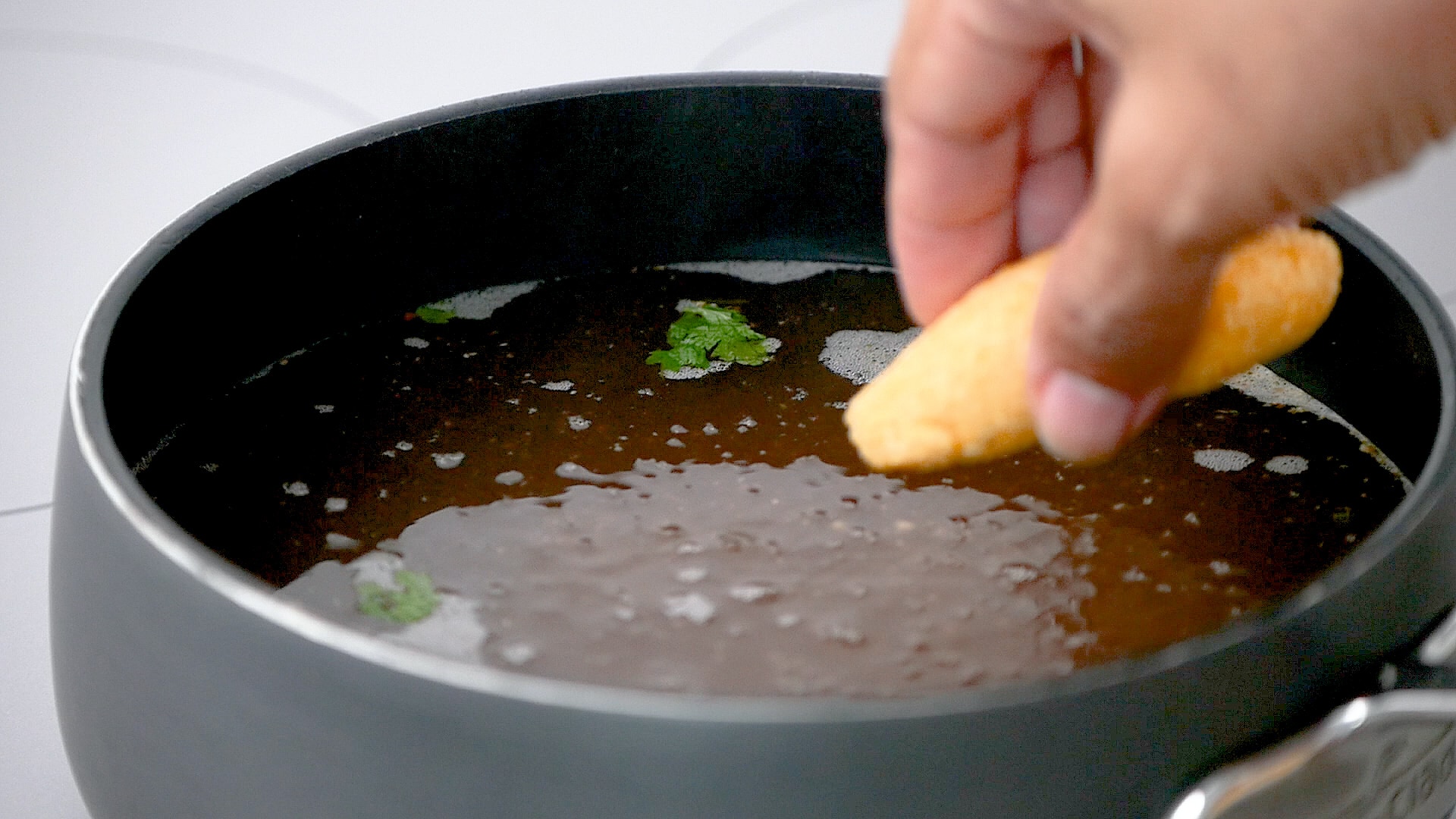 putting in boiling broth