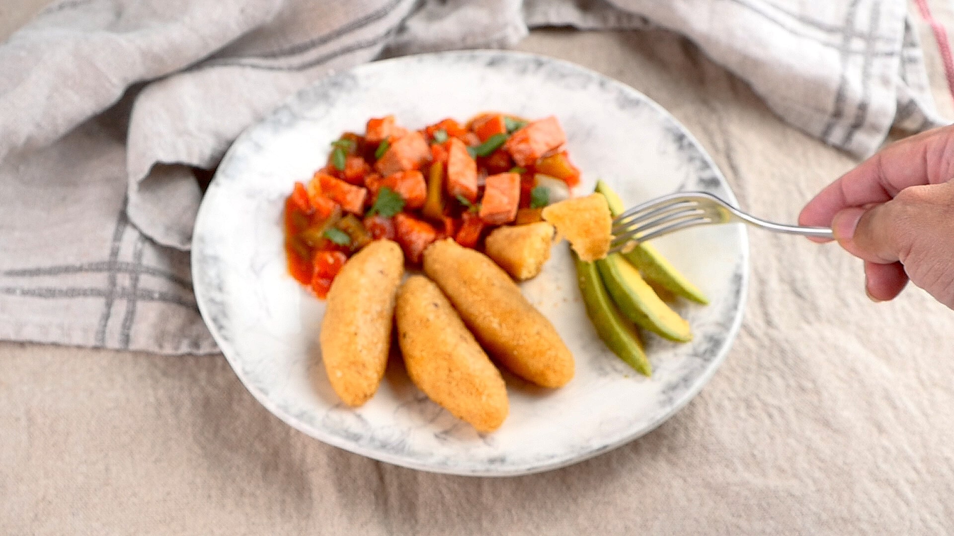 bollitos served with salami and avocado