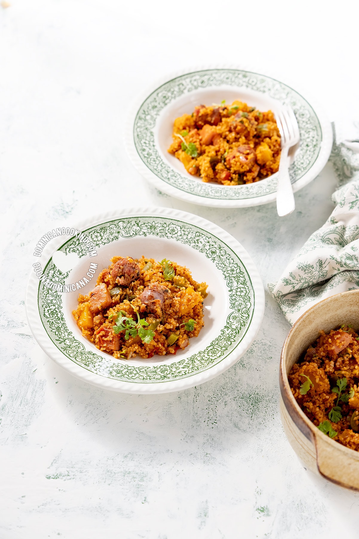 Plates of Locrio de Trigo (Dominican Bulgur Pilaf)