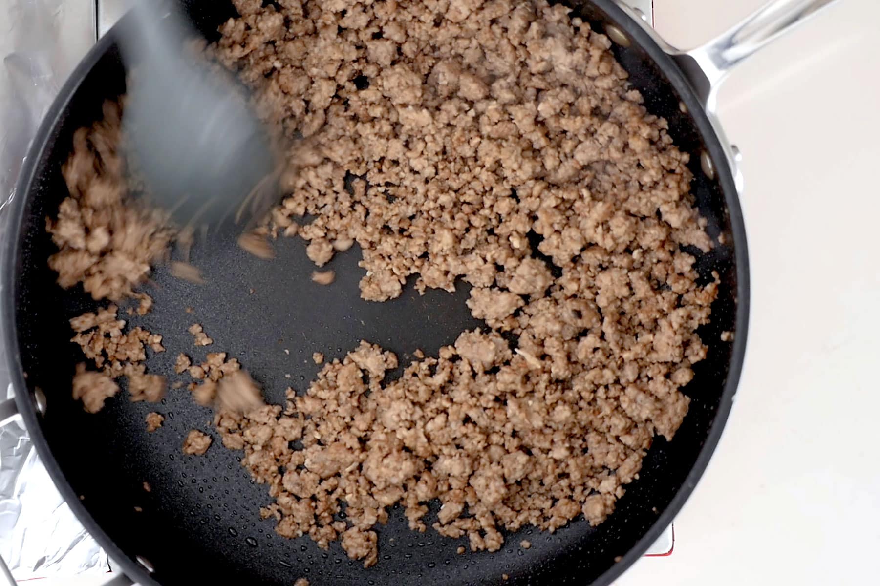 Minced meat cooking in pan