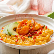 spicy sauteed shrimp served on grits