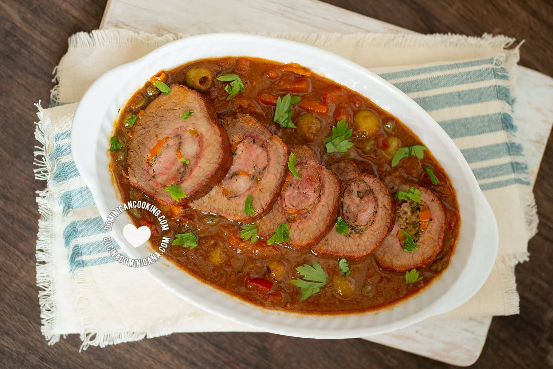 Carne mechada sliced and served in sauce