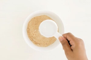 Adding water to yuca flour