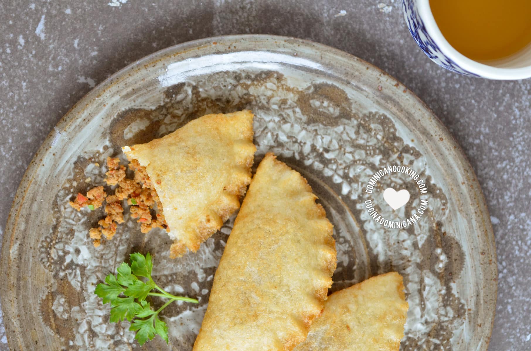 3 yuca empanadas served