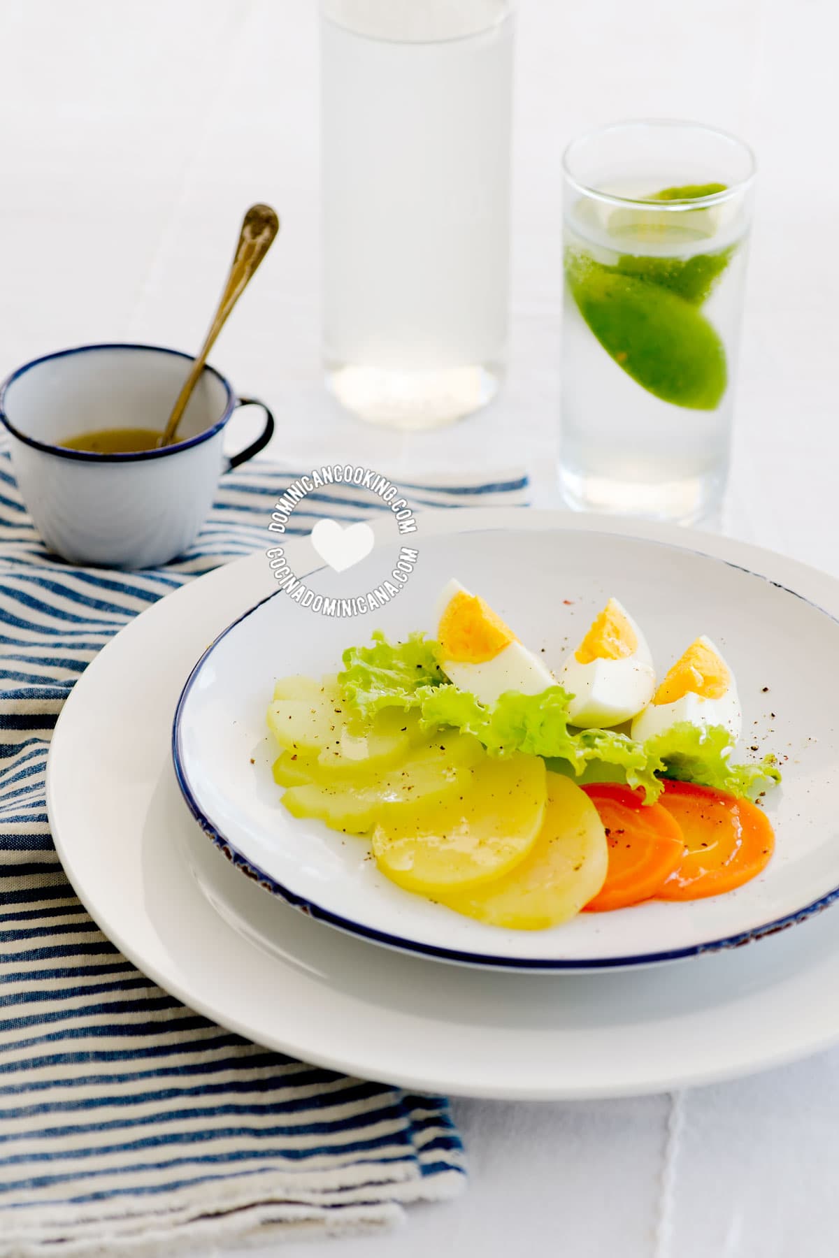 Ensalada Hervida (Boiled Salad) served alongside vinaigrette