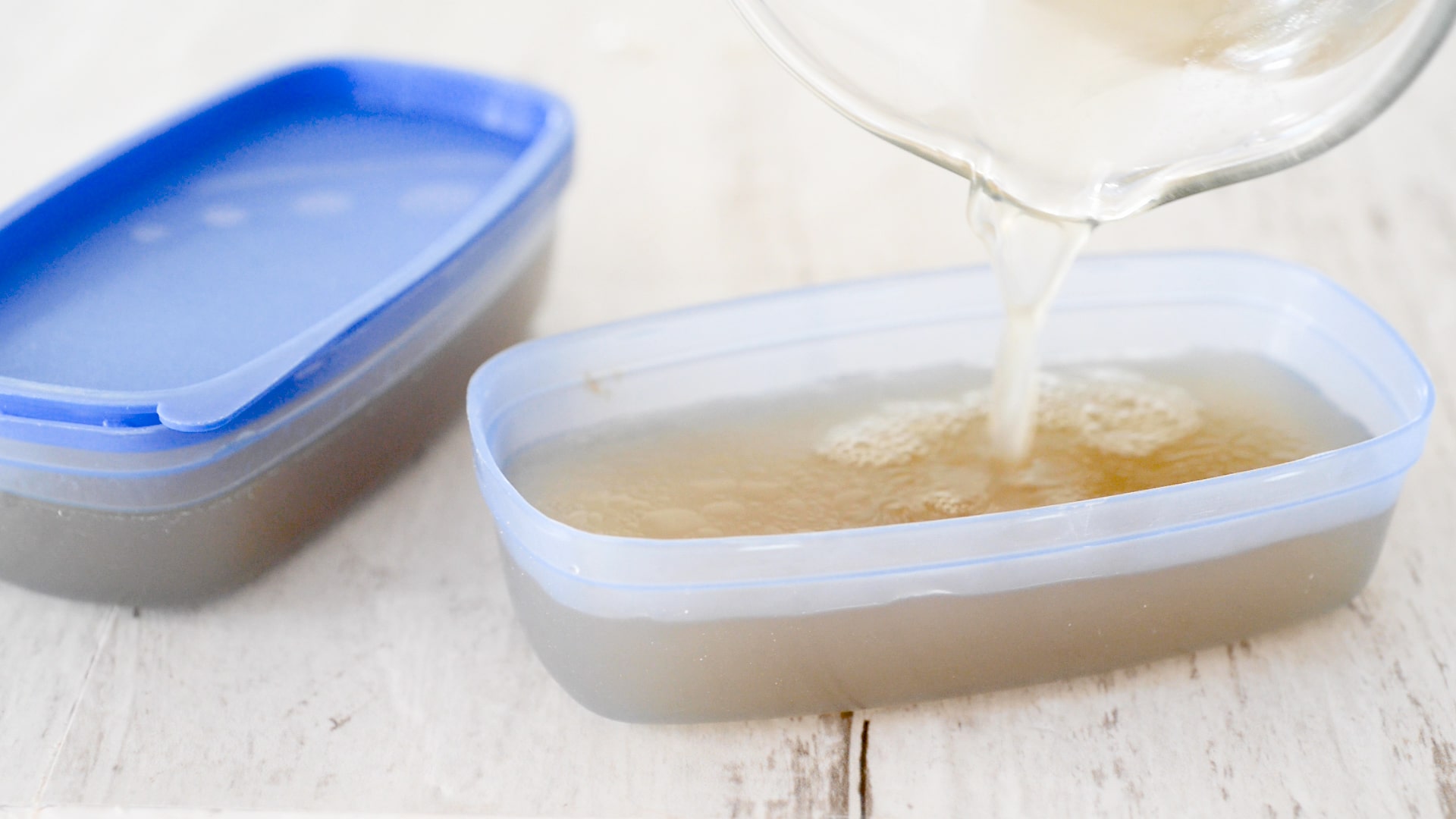 Pouring broth into freezer containers