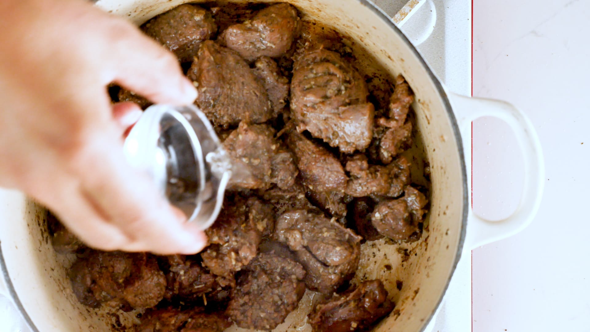 Adding a bit of water to the meat