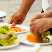 Dominican men cooking hands