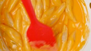 Cooking domplines in cheese sauce