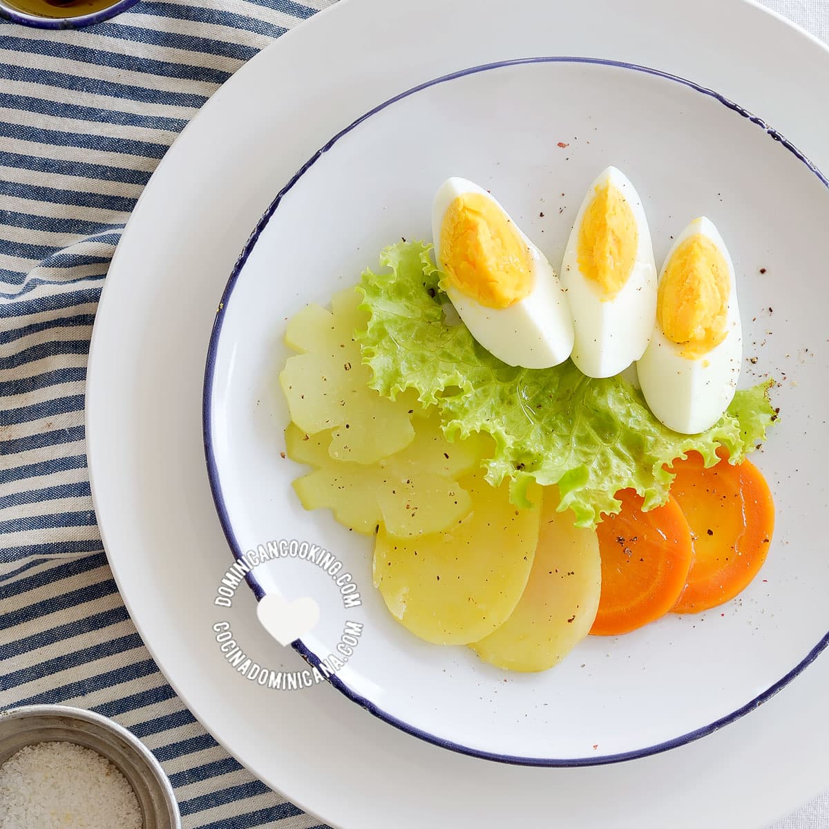 Ensalada Hervida (Boiled Salad) served alongside vinaigrette seen from above