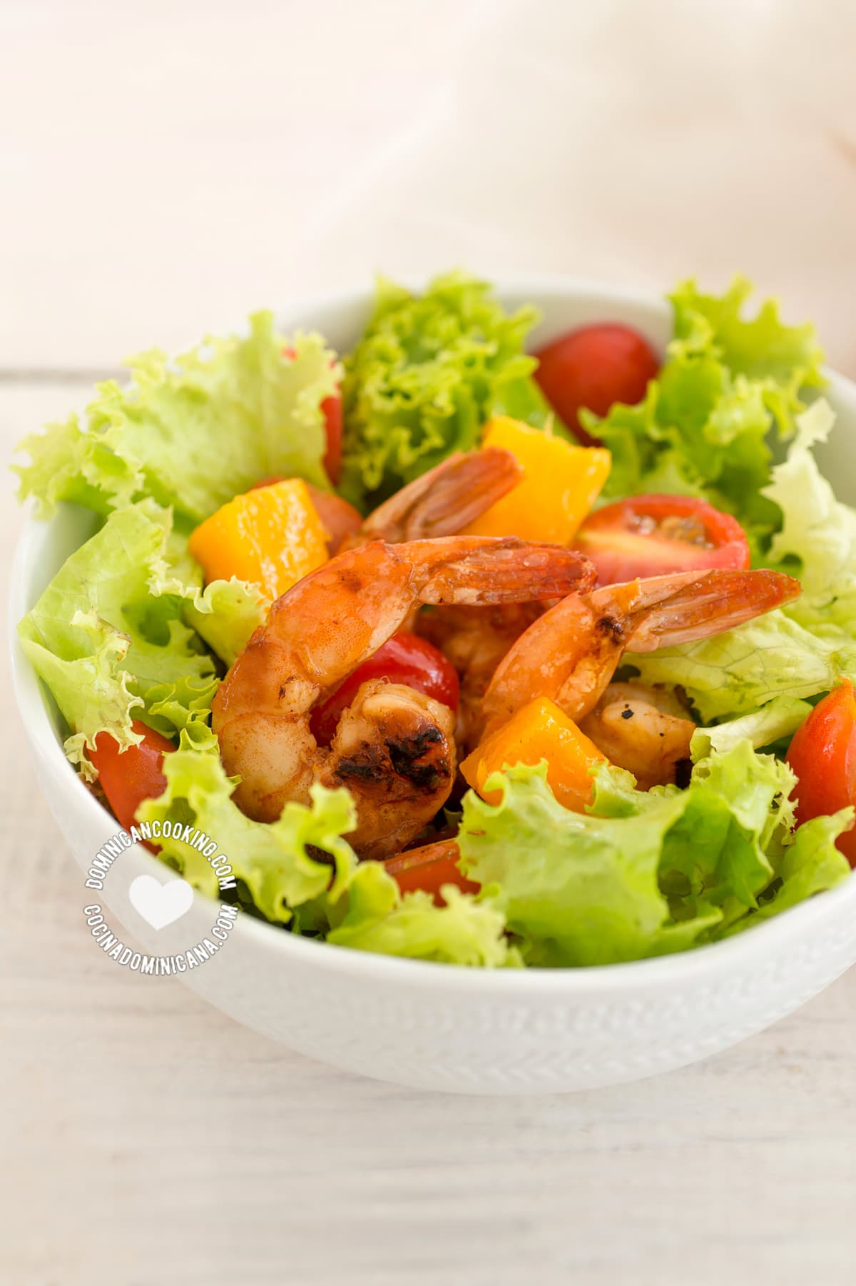 Grilled shrimp and mango salad in a bowl