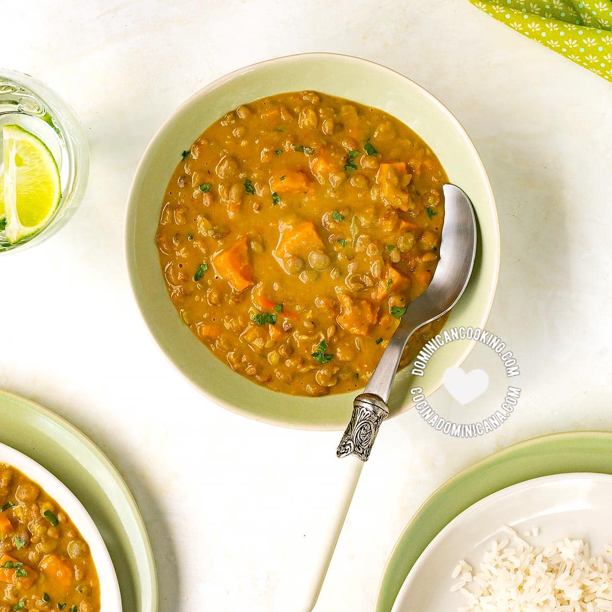 Bowl of Guandules con Coco (Pigeon Peas with Coconut) Served with Rice and Tostones