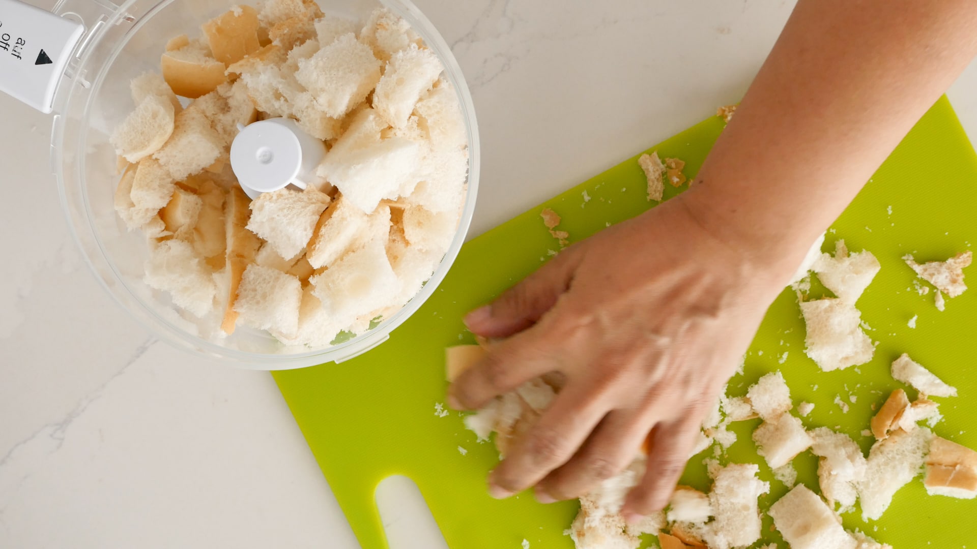 Putting diced bread in food processor