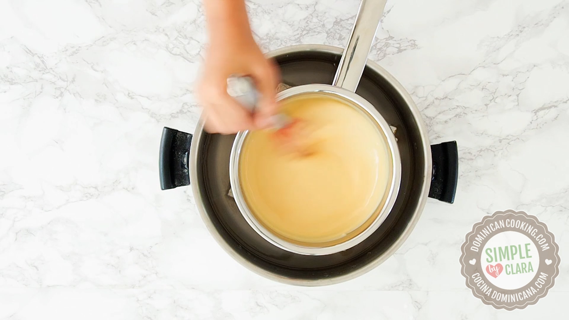 Making sweet sauce over hot water bath