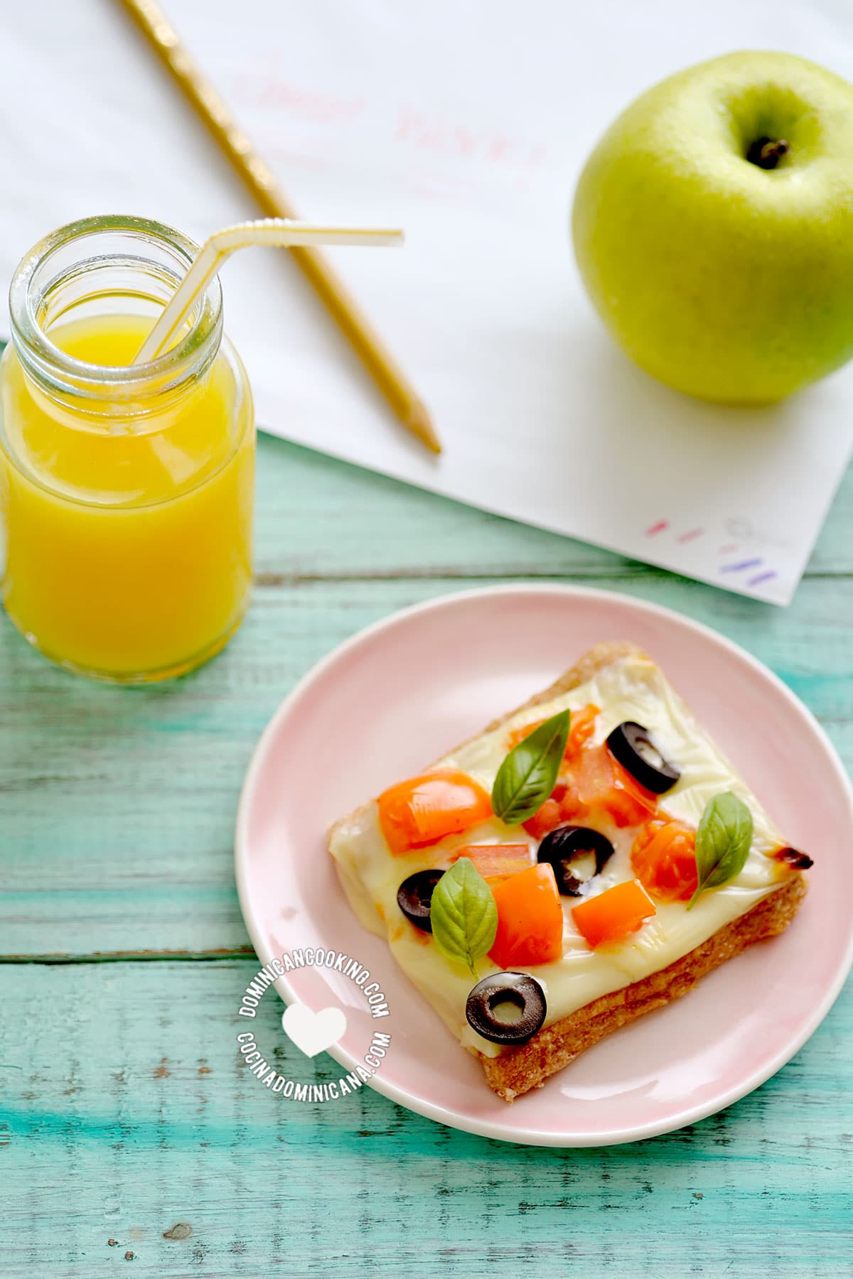 Whole Wheat Cheese and Veggies Tartlet Served with juice and an apple