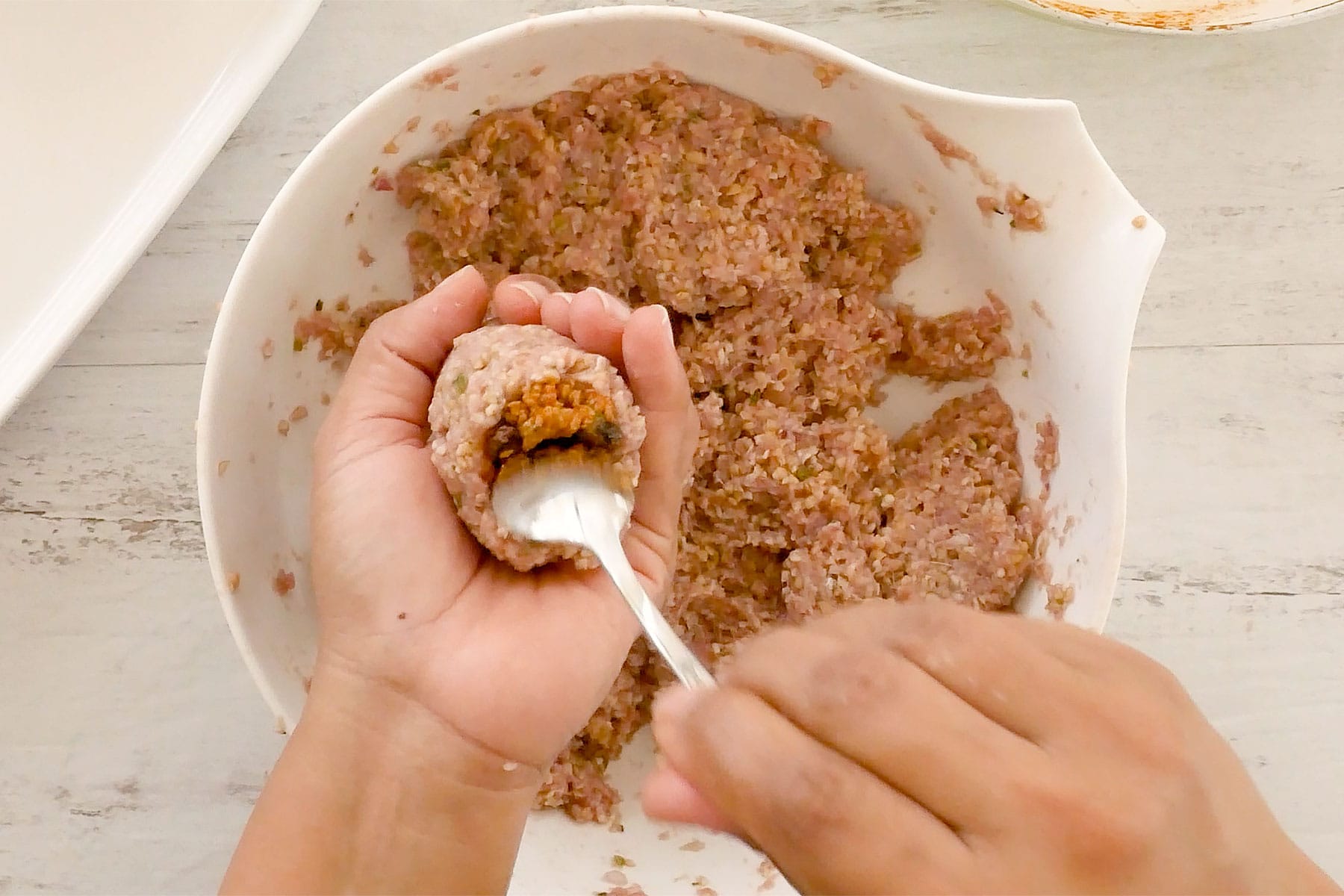 Filling hole with cooked meat