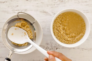 Removing bulgur from water using a fine sieve