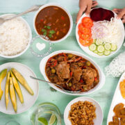 La Bandera Dominicana: Traditional Dominican Lunch Meal with Rice, Beans, Meat, and Salad