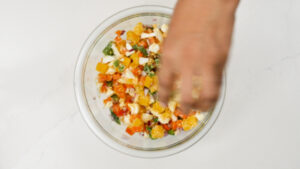 Mixing potato salad
