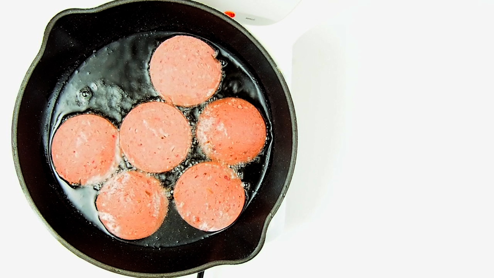 Frying salami