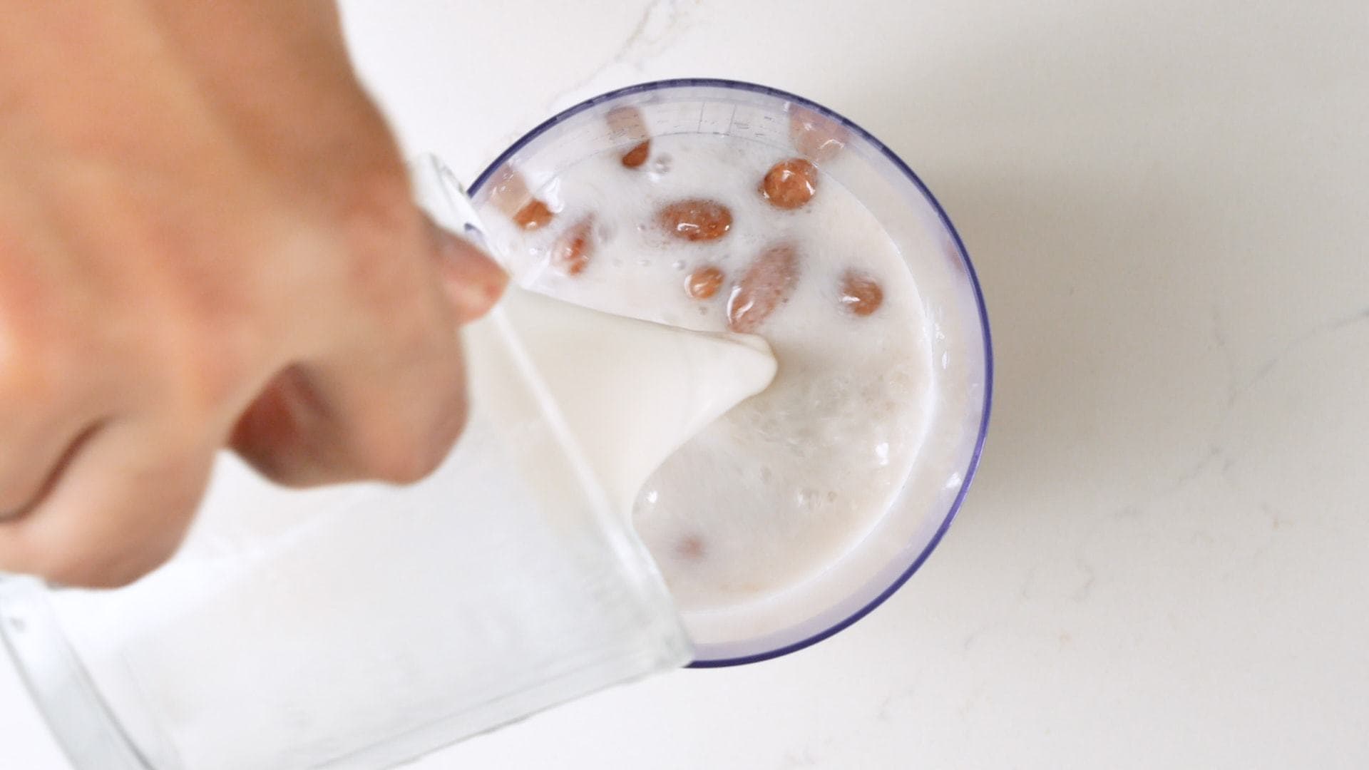 Adding milk to beans