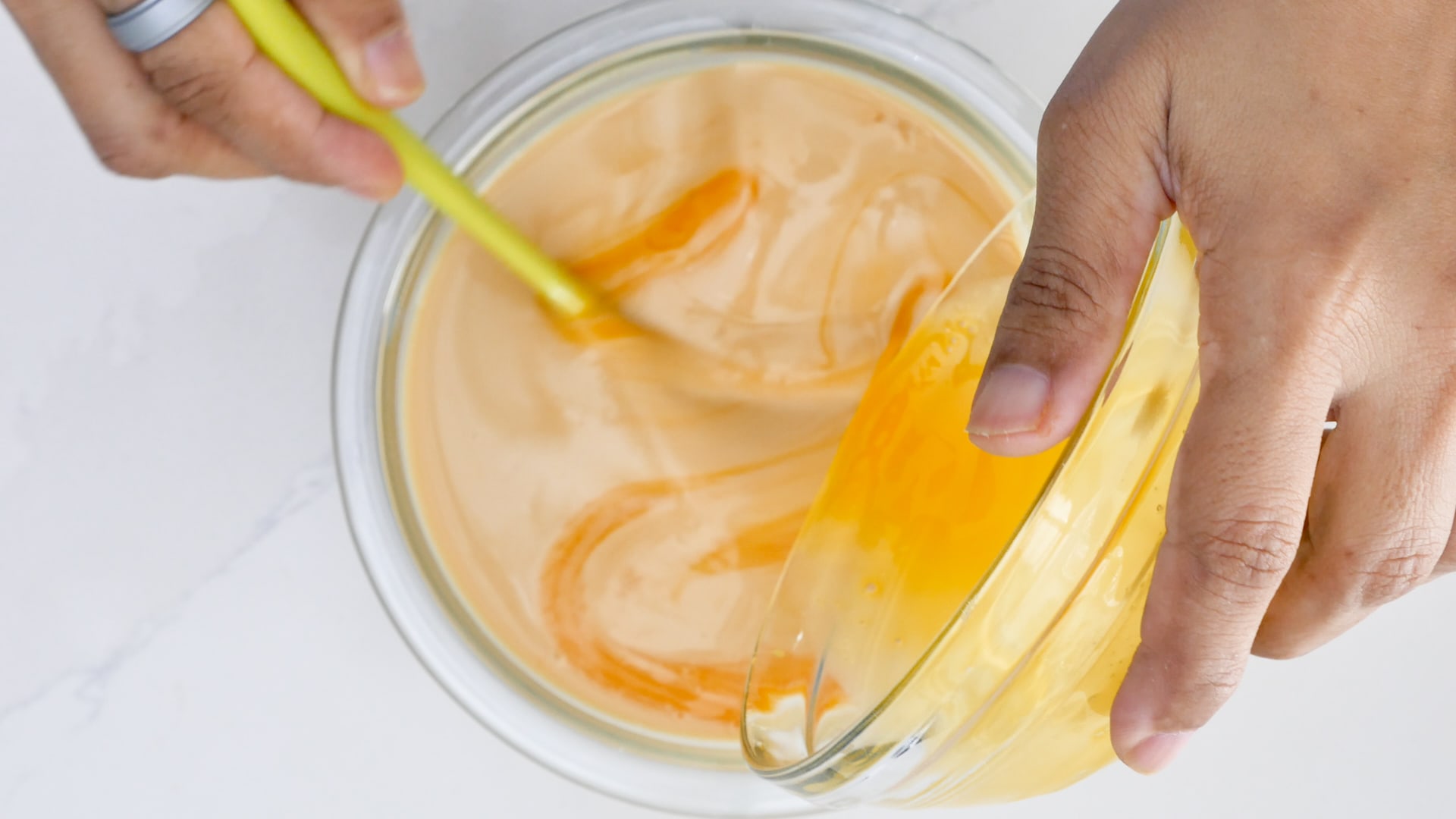 Mixing egg yolks into milk