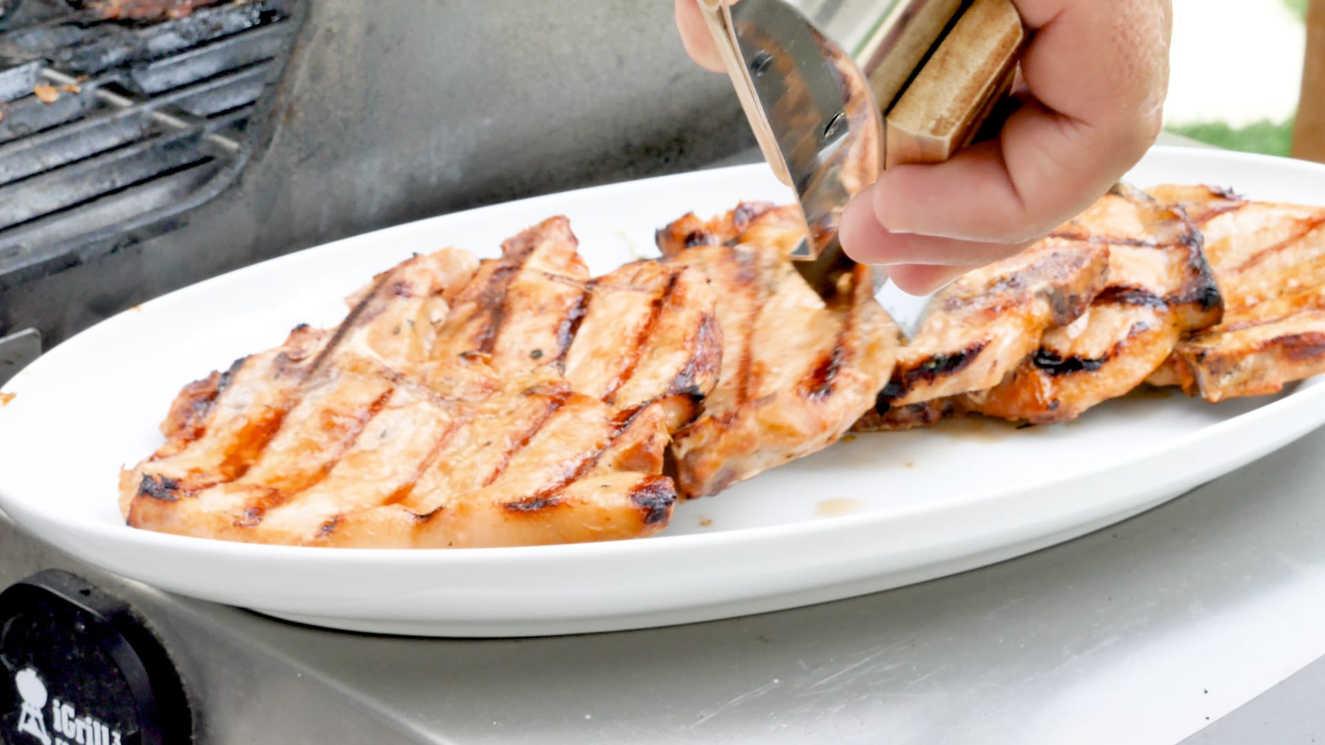 Putting the pork chops on serving plate