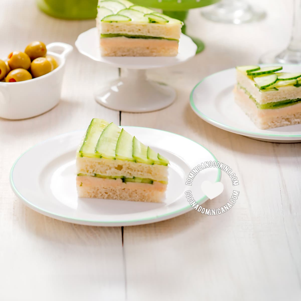 Several Ham, Cheese, and Cucumber Tea Sandwiches