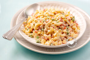 Plate with Ensalada de Coditos (Elbow Pasta Salad)