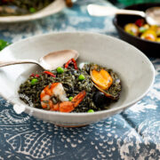 Plate of Spanish Seafood Black Rice with Shrimp and Shellfish