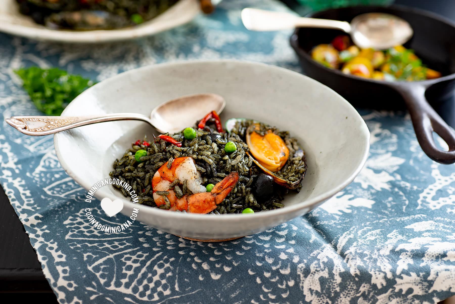 Plate of Spanish Seafood Black Rice with Shrimp and Shellfish