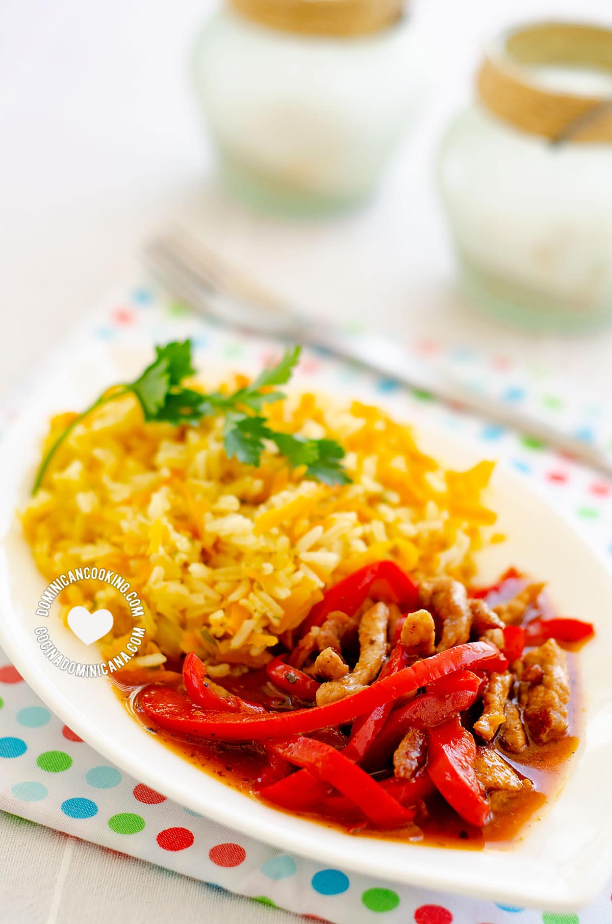 Plate of Spicy Pepper and Orange Beef with Yellow Rice