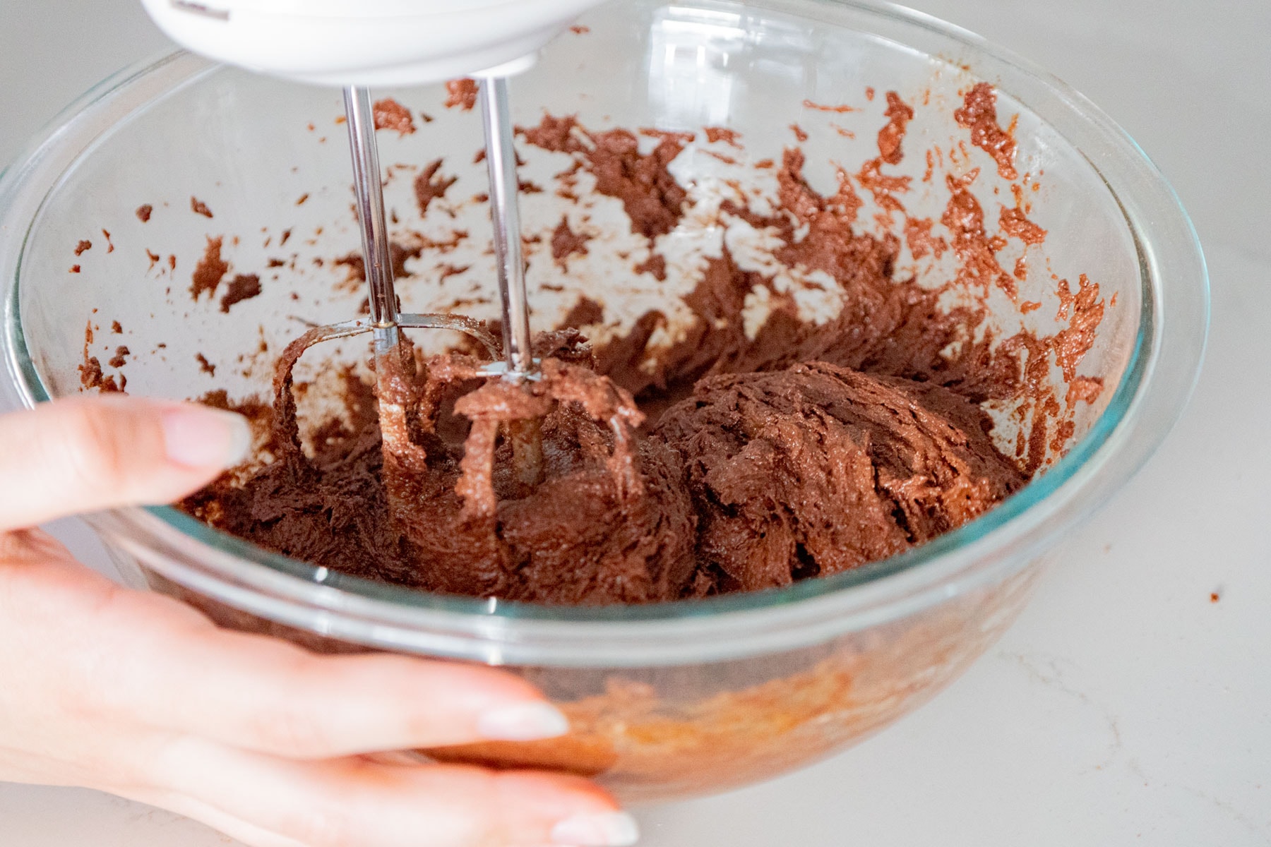 Mixing batter with hand mixer