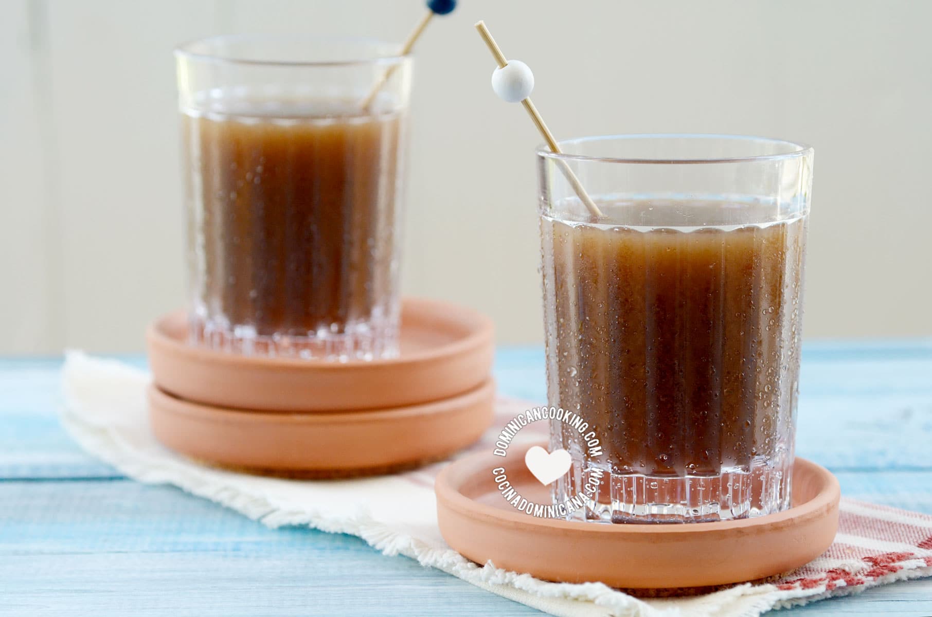 Two glasses of champola de tamarindo (tamarind juice)