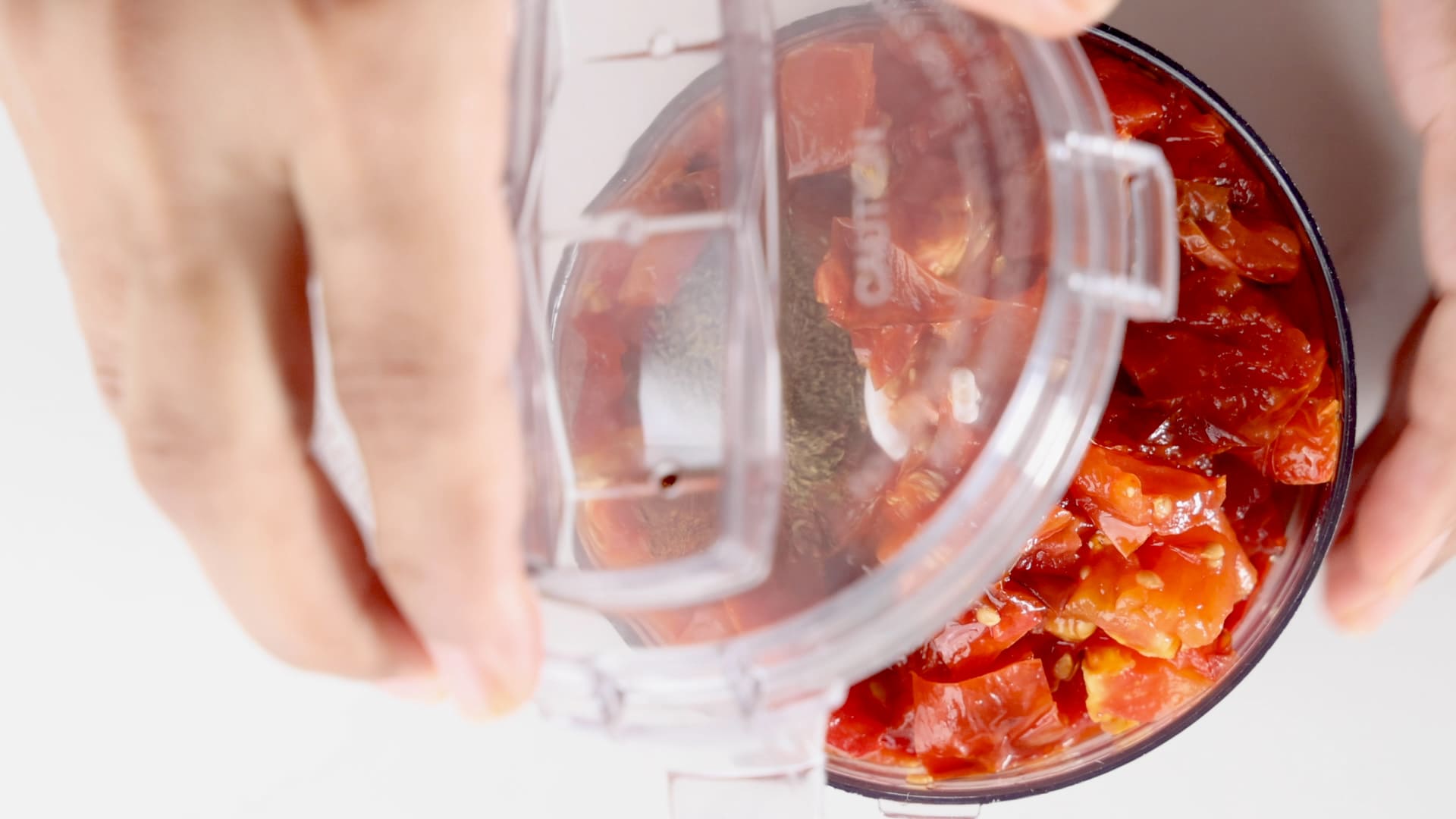 Putting lid on food processor