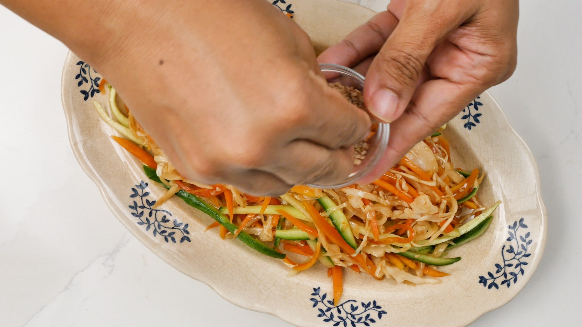 Sprinkling sesame seeds