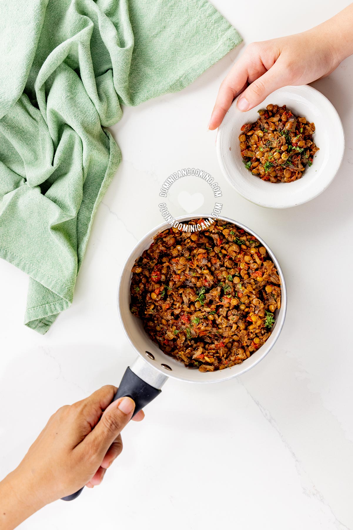 Pot and bowl of lentil and mushroom vegan stuffing for empanadas