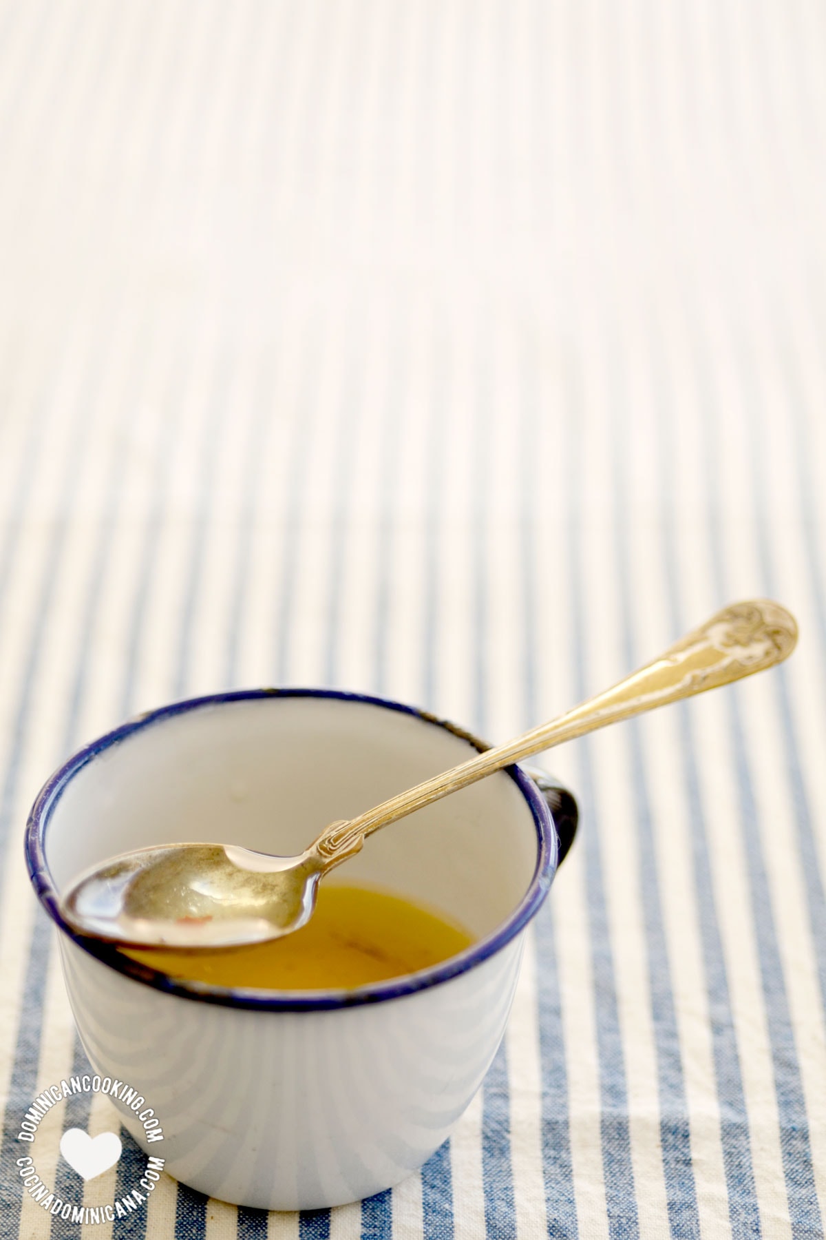 Vinaigrette in cup with spoon