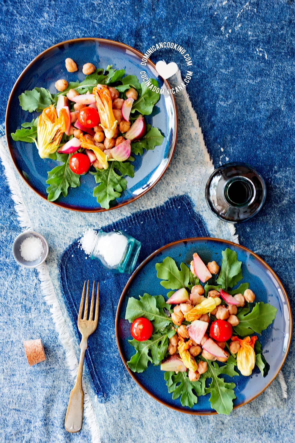 Plates of zucchini flower salad with chickpea